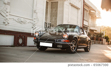 Retro vintage black car, motorshow or auto exhibition 65067300