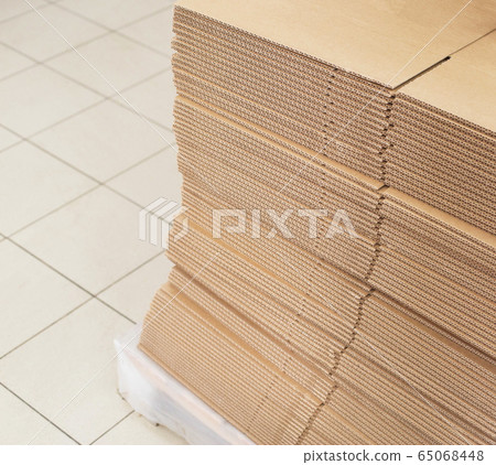 A stack of sheets of industrial packaging board. Cardboard Sheets for Boxes, copy space, industrial, carton 65068448