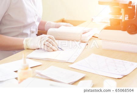 nurse notes in the medical journal the birth rate in the hospital, background. Birth control nurse notes in the medical journal the birth rate in the hospital, background. Birth control 65068504