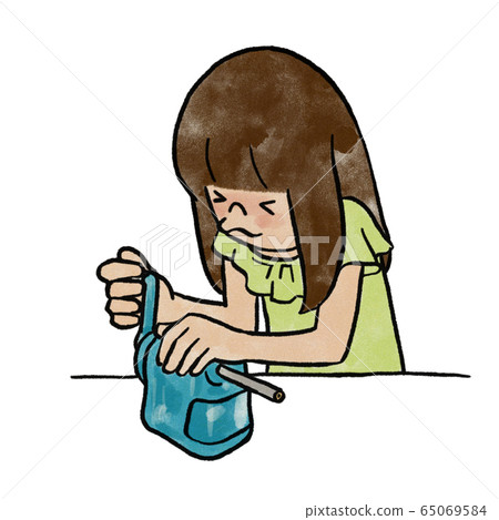 A girl sharpening a pencil 65069584
