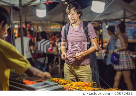 Coronavirus is over. Quarantine weakened. Take off the mask. Now you can be on Walking street Asian Coronavirus is over. Quarantine weakened. Take off the mask. Now you can be on Walking street Asian 65072421
