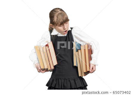 schoolgirl with books under her arm schoolgirl with books under her arm 65073402