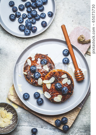 Tofu pancakes with blueberries and honey Tofu pancakes with blueberries and honey 65073730