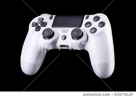 White video game joystick gamepad isolated on a White video game joystick gamepad isolated on a 65074220