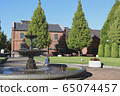 Fountain and girl 65074457