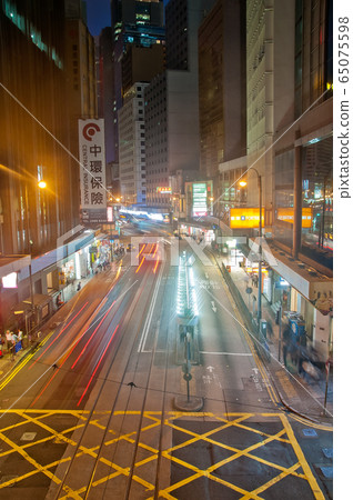 Light blur motion scene of tram and traffic in Hong Kong Light blur motion scene of tram and traffic in Hong Kong 65075598