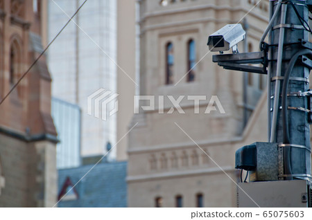 Surveillance CCTV street outdoor camera watching citizen Surveillance CCTV street outdoor camera watching citizen 65075603