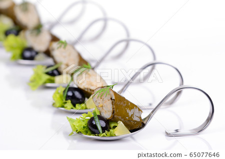 Greek appetizers on party spoons Greek appetizers on party spoons 65077646