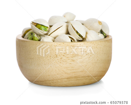 pistachios an isolated on a white background pistachios an isolated on a white background 65079378