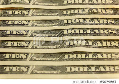 ten dollar bills 65079663