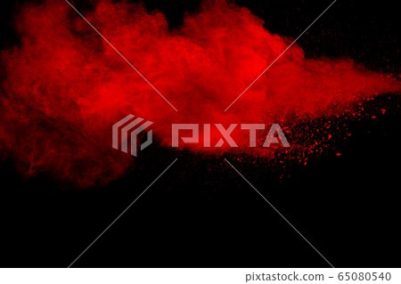 Red particles explosion on black background. Freeze motion of red dust splash. Red particles explosion on black background. Freeze motion of red dust splash. 65080540