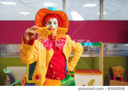 Funny clown in star glasses 65080846