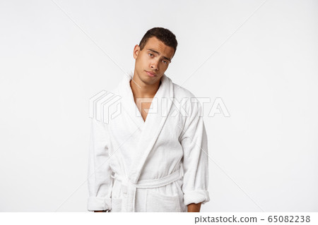 Puzzled African American man trying to remember important information, pensive thoughtful young male 65082238