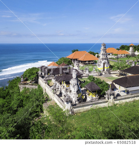 Aerial view of Balinese temple at coastline 65082518
