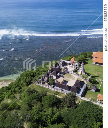 Aerial view of Balinese temple at coastline 65082519