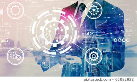Automation concept with businessman holding a tablet 65082928