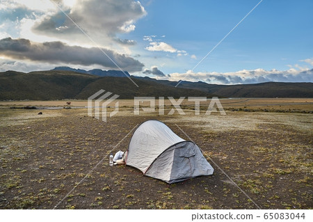 Tent on a high mountain plateau 65083044
