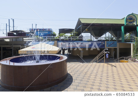 Fountain near entrance to the beach "Dolphin" in the resort town of Adler, Sochi Fountain near entrance to the beach "Dolphin" in the resort town of Adler, Sochi 65084533