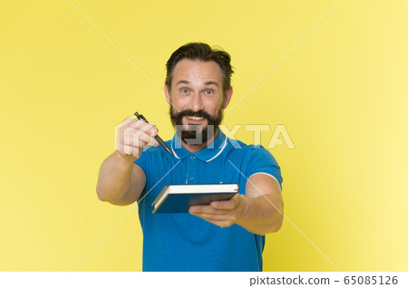 Signing concept. Happy man offer signing paper 65085126