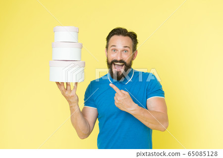 Prepared for holidays. Man mature bearded guy hold 65085128