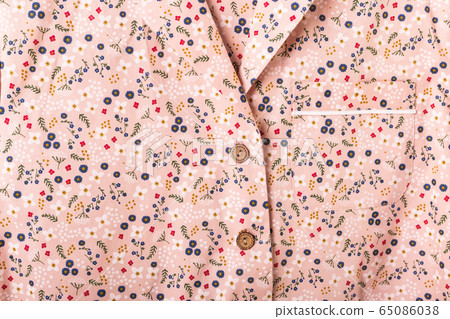 Close-up detail and fabric texture of a pajama. Home wear, sleepwear, shopping and sale concept. Close-up detail and fabric texture of a pajama. Home wear, sleepwear, shopping and sale concept. 65086038