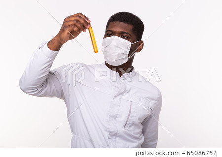 Medical researcher holding test tube with liquid. Vaccine development, coronavirus, covid-19 and science concept. 65086752