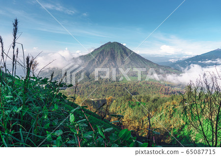 Photograph of high volcano with clouds on Java Photograph of high volcano with clouds on Java 65087715