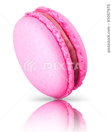 Macro photo of french pink rose macaroon isolated on white background 65087978
