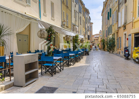 Street with empty restaurant and terrace Saint Street with empty restaurant and terrace Saint 65088755