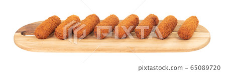 Brown crusty dutch kroketten on a serving tray 65089720