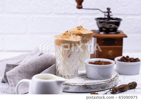 Dalgona whipped coffee with milk 65090975