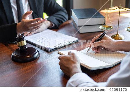 Male lawyer discussing negotiation legal case with 65091170