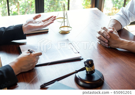 Professional male lawyer or counselor discussing 65091201