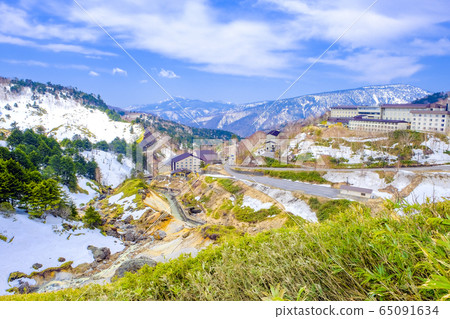 Manza Onsen 3 with remaining snow and fresh greenery Manza Onsen 3 with remaining snow and fresh greenery 65091634