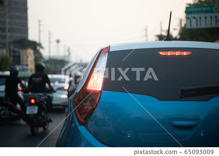 Cars on busy road in the city with traffic jam 65093009