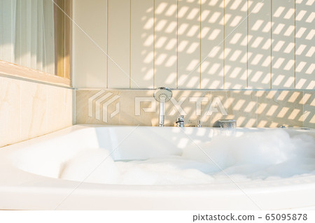 White bathtub and jacuzzi decoration interior White bathtub and jacuzzi decoration interior 65095878