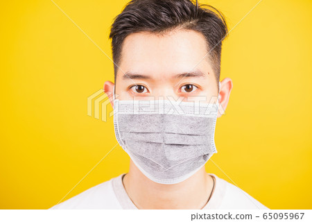 man wearing face mask protective germ virus or air 65095967