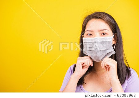 woman wearing face mask protective against 65095968