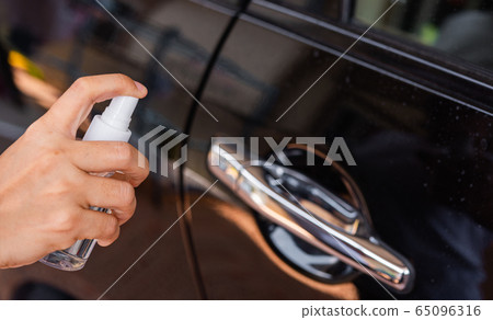 woman applying press dispenser sanitizer alcohol woman applying press dispenser sanitizer alcohol 65096316