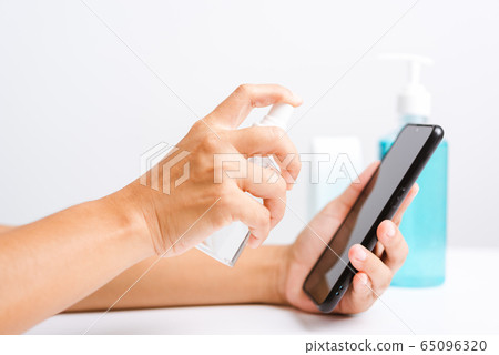 woman applying press dispenser sanitizer alcohol woman applying press dispenser sanitizer alcohol 65096320