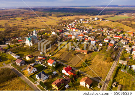 Aerial view of houses and nature of Wlodowice Aerial view of houses and nature of Wlodowice 65096529