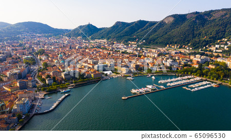 Panoramic view from the drone on the city Como. Italy Panoramic view from the drone on the city Como. Italy 65096530