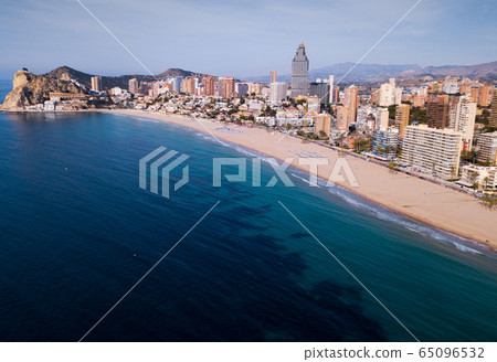 Aerial view of coast at Benidorm cityscape with a modern apartments Aerial view of coast at Benidorm cityscape with a modern apartments 65096532