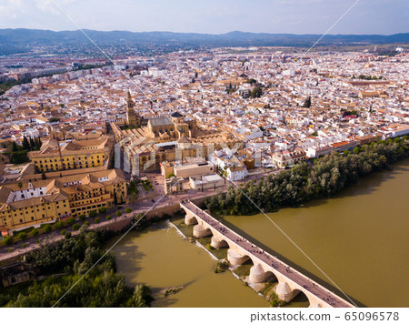 Aerial view of Cordoba with Roman Bridge and Mosque-Cathedral 65096578
