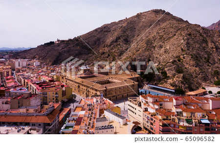 View of Orihuela in Alicante with old University, mountains and buildings View of Orihuela in Alicante with old University, mountains and buildings 65096582