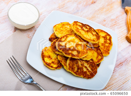 Cottage cheese pancakes, russian cuisine Cottage cheese pancakes, russian cuisine 65096650