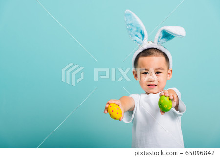 child boy wearing bunny ears and white T-shirt, child boy wearing bunny ears and white T-shirt, 65096842