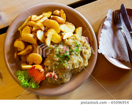 Polish stew of pork ribs and sauerkraut Polish stew of pork ribs and sauerkraut 65096954