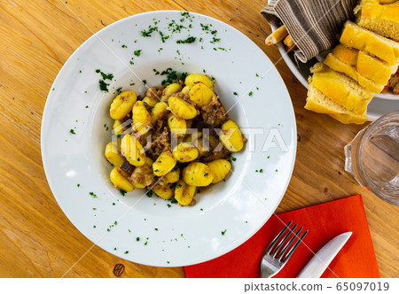 Gnocchi with aubergine and minced meat Gnocchi with aubergine and minced meat 65097019
