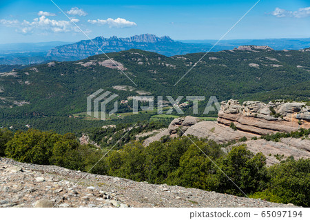Landscape with mountains at Park Natural de Sant Llorenc del Munt, Spain Landscape with mountains at Park Natural de Sant Llorenc del Munt, Spain 65097194
